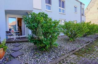 Wohnung kaufen in 69207 Sandhausen, ATIK: Charmante, modernisierte 1,5-Zimmer-Wohnung mit Terrasse und zwei Stellplätzen in ruhiger Lage