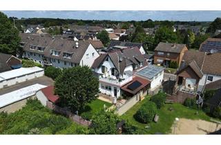 Wohnung kaufen in 41569 Rommerskirchen, Großzügige Maisonette-Wohnung für Sonnenliebhaber