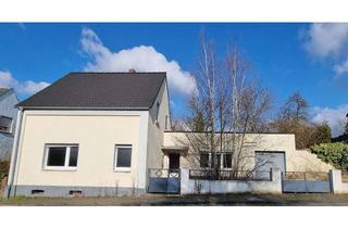 Einfamilienhaus kaufen in 40764 Langenfeld, WERTVOLLES GRUNDSTÜCK + KLEINES EINFAMILIENHAUS MIT WINTERGARTEN UND GARAGE
