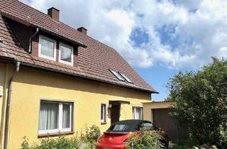 Haus kaufen in 31167 Bockenem, DHH mit Garage in Dorfrandlage wartet auf neuen Leben