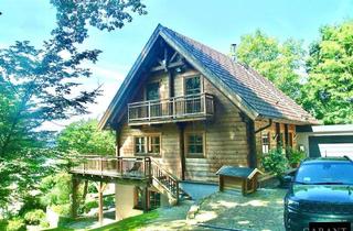 Haus kaufen in 96129 Strullendorf, Bezauberndes Tiroler Holzhaus mit Einliegerwohnung, Schwimmteich & Sauna