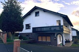Einfamilienhaus kaufen in 35274 Kirchhain, Charmantes Einfamilienhaus mit separater Einliegerwohnung in ruhiger Lage