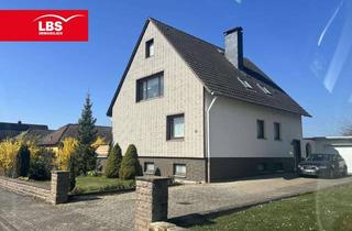 Haus kaufen in 31789 Hameln, Gepflegtes Zweifamilienhaus m. Doppelgarage und Garten und Ausbaupotenzial