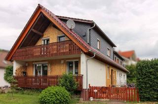 Haus kaufen in 36163 Poppenhausen, Am Fuße der Wasserkuppe: Stilvolles Zweifamilienhaus mit möglicher Ferienwohnung in Poppenhausen