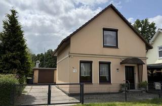 Einfamilienhaus kaufen in 25436 Moorrege, Älteres Einfamilienhaus auf schönem Grundstück