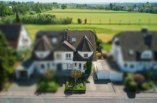 Haus kaufen in 63486 Bruchköbel, Elegantes Wohnen mit Garten in Feldrandlage in begehrter Lage von Bruchköbel-Stadt