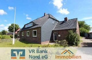 Haus kaufen in 25923 Süderlügum, Wohnen im skandinavischen Stil - DHH mit Nebengeb. in attraktiver Ortsrandlage ohne Hinterbebauung