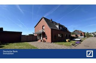 Doppelhaushälfte kaufen in 47228 Bergheim, Doppelhaushälfte mit tollem Grundstück für Gartenliebhaber