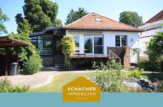 Einfamilienhaus kaufen in 14612 Falkensee, Zur Sanierung: Charmantes Einfamilienhaus mit Wintergarten von 1928 auf sonnigem Südgrundstück