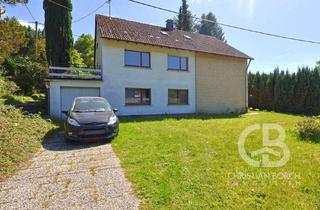 Einfamilienhaus kaufen in 51674 Wiehl, Einfamilienhaus mit Einliegerwohnung in Wiehl-Hückhausen