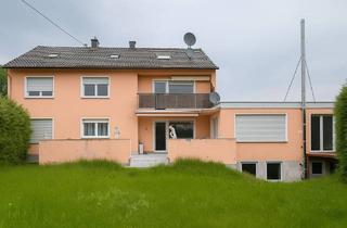 Haus kaufen in Taitinger Straße 16, 86453 Dasing, In zentraler Lage von Dasing präsentiert sich dieses gepflegte Mehrparteienhaus als seltene Gelegenh