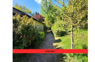 Wohnung kaufen in 67659 Kaiserslautern, Kaiserslautern - Geräumige Parterre-Eigentumswohnung mit eigenem Grundstück und Stellplätzen in ruhiger Ortsrandlage