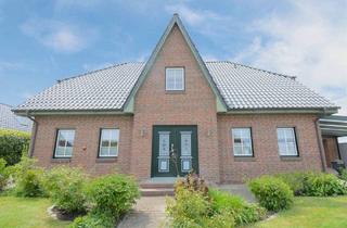 Einfamilienhaus kaufen in 25792 Neuenkirchen, Neuenkirchen - Friesenstil trifft Wohnkomfort - Großzügiges Einfamilienhaus mit Gartenidylle in Neuenkirchen
