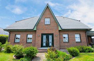 Einfamilienhaus kaufen in 25792 Neuenkirchen, Neuenkirchen - Friesenstil trifft Wohnkomfort - Großzügiges Einfamilienhaus mit Gartenidylle in Neuenkirchen