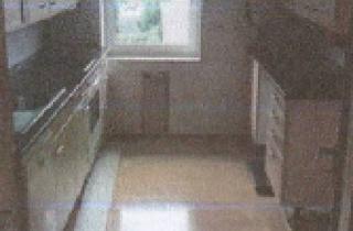 Mehrfamilienhaus kaufen in 97318 Kitzingen, Kitzingen - Vermietetes Mehrfamilienhaus mit 3 Wohneinheiten und Garagen in Kitzingen, OT