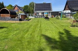 Einfamilienhaus kaufen in 27639 Wurster Nordseeküste, Wurster Nordseeküste - Haus mit PV Anlage, Sauna, Whirlpool und eigenem Wald