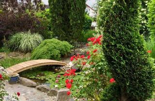 Doppelhaushälfte kaufen in 76351 Linkenheim-Hochstetten, Charmante Doppelhaushälfte mit Garten in ruhiger Lage – Ihr neues Zuhause in Linkenheim-Hochstetten
