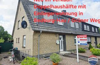 Doppelhaushälfte kaufen in 47551 Bedburg-Hau, Solide Doppelhaushälfte mit Einliegerwohnung und großem Grundstück