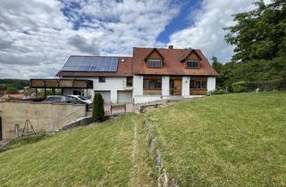 Mehrfamilienhaus kaufen in Kapellenstrasse, 97702 Münnerstadt, MEHRFAMILIENHAUS MIT 3 WOHNUNGEN, PV-ANLAGE UND BAURESERVE.