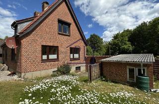 Haus kaufen in 23730 Sierksdorf, Sierksdorf - Gemütliches Zweifamilienhaus auf großem, gepflegten Grundstück