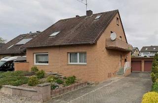 Haus kaufen in 32107 Bad Salzuflen, Vielseitiges Ein- bis Zweifamilienhaus mit Garagen in ruhiger Lage von Bad Salzuflen-Holzhausen