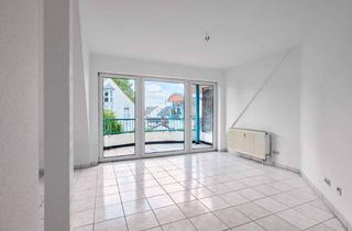 Wohnung kaufen in 63571 Gelnhausen, Gemütliche Dachgeschosswohnung mit Balkon – direkt am Bahnhof in Gelnhausen-Hailer