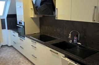 Wohnung kaufen in 32105 Bad Salzuflen, Gemütliche DG-Wohnung mit Loggia und EBK in Kurparknähe