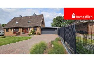 Doppelhaushälfte kaufen in 25569 Krempermoor, Schöne Doppelhaushälfte mit Doppelgarage