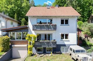 Mehrfamilienhaus kaufen in 35321 Laubach, Großzügiges Mehrfamilienhaus am Waldrand – 230 m² Wohntraum mit Garten, Wintergarten & Garage