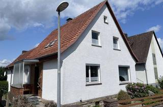 Einfamilienhaus kaufen in 34393 Grebenstein, Einfamilienhaus mit Doppelgarage und großem Grundstück in Grebenstein-Udenhausen