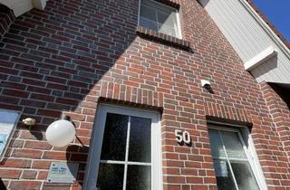 Haus kaufen in Seepark 20b, 26969 Butjadingen, Ferienhaus mit gehobener Innenausstattung im Seepark Burhave mit Schwimmbad und Saunabereich