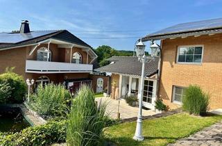 Einfamilienhaus kaufen in 57629 Heimborn, Traumhaftes Einfamilienhaus mit Nebengebäuden, Photovoltaik & großem Garten in idyllischer Lage!