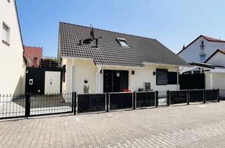 Einfamilienhaus kaufen in 68647 Biblis, Attraktives Einfamilienhaus in ruhiger Lage mit hochwertiger Ausstattung