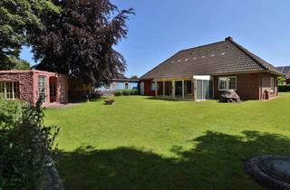 Haus kaufen in 25927 Neukirchen, Liebevoll gepflegter Bungalow mit Wintergarten, großem Garten, Carport, Garage und Ausbaureserve