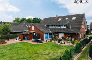 Haus kaufen in 49681 Garrel, Garrel - Platz für zwei Familien! 303 m² Wfl. 2 Wohneinheiten, großes Grundstück - seltenes Angebot in Garrel