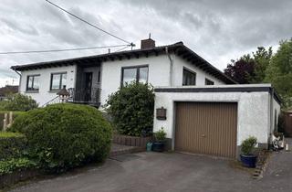 Haus kaufen in Hauptstraße 12, 57614 Stürzelbach, Gepflegter Bungalow mit großem Garten und vermieteter Einliegerwohnung