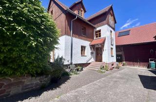Haus kaufen in 36167 Nüsttal, Zwei Wohnträume auf einem Grundstück mit Scheune und Potenzial