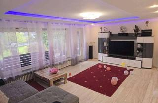 Wohnung kaufen in 32120 Hiddenhausen, Großzügige Erdgeschosswohnung mit Souterrain, Gartenidylle und vielen Möglichkeiten