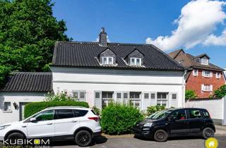 Haus kaufen in 42781 Haan, Haan. Denkmalgeschützes Juwel mit idyllischem Garten und Garage.