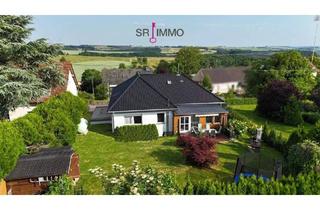 Haus kaufen in 54673 Karlshausen, Karlshausen - Familienidylle trifft auf Wohnkomfort