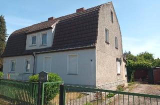 Einfamilienhaus kaufen in 17398 Ducherow, Ducherow - Doppelhaushälfte auf großem Grundstück