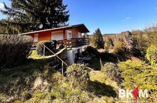 Haus kaufen in 98701 Herschdorf, Rückzugsort mit Weitblick – Charmantes Ferienhaus in Hanglage