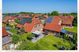 Einfamilienhaus kaufen in 26556 Westerholt, Top modernisiertes Einfamilienhaus mit Photovoltaik & Gartenidylle!