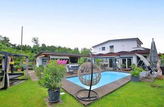 Mehrfamilienhaus kaufen in 79415 Bad Bellingen, Mehrfamilienhaus-Ensemble mit 7 Wohnungen, Pools, Whirlpool & Outdoor-Küche in Bad Bellingen