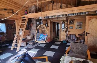 Haus kaufen in 35647 Waldsolms, Liebevoll eingerichtetes Holzhaus in Waldsolms-Hasselborn