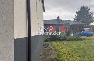 Doppelhaushälfte kaufen in 90574 Roßtal, Zweifamilienhaus mit 500 m2 Grundstück