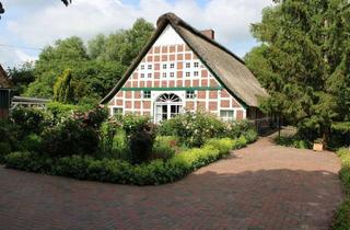 Haus kaufen in 21775 Odisheim, Im Garten der Träume - romantisches Landhaus mit Bootssteg und Motorboot direkt am Hadelner Kanal