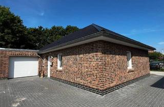 Einfamilienhaus kaufen in 26683 Saterland, Saterland - Energieeffizienter Neubau-Bungalow im Zentrum von Scharrel