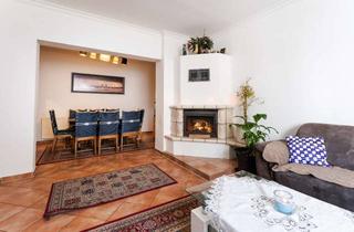 Wohnung kaufen in 51377 Manfort, Geräumige Erdgeschosswohnung mit Garten und Terrasse