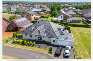 Haus kaufen in 26897 Esterwegen, Familienfreundlicher Bungalow mit Terrassen, Gartenblick & viel Platz
